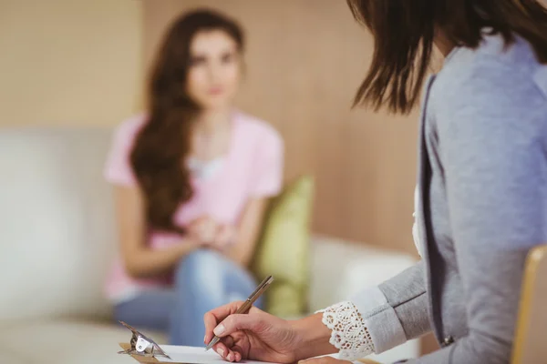 depositphotos_81820848-stock-photo-therapist-listening-to-her-patient.jpg